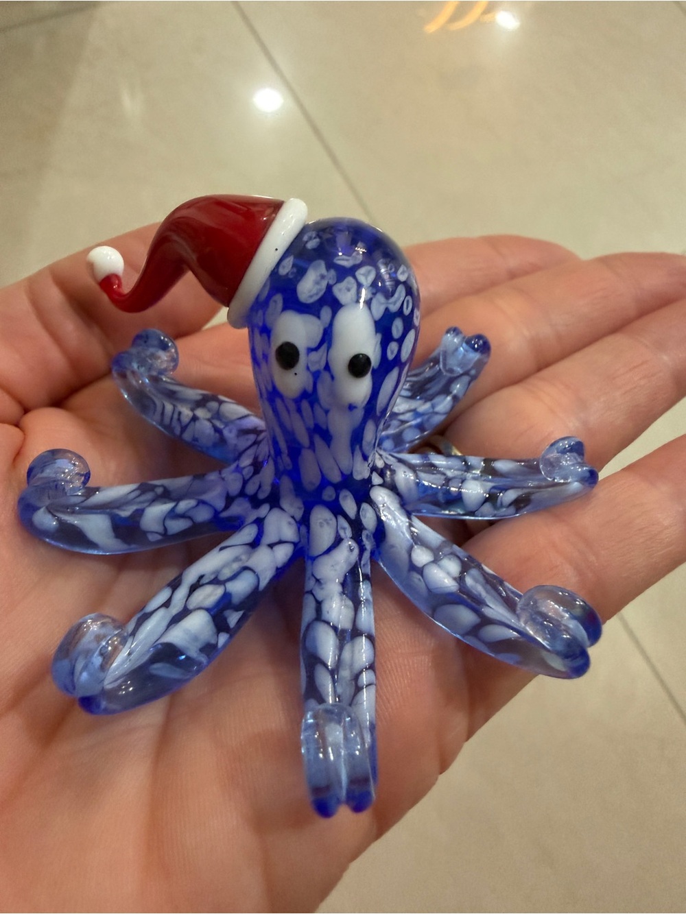Pier 1 Blue and White Glass Octopus with Red Santa Hat